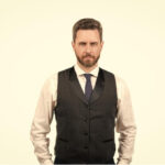 The Timeless Elegance of Men's Suit Vests: A Comprehensive Exploration